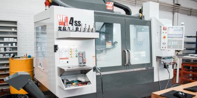 A CNC milling machine in an industrial workshop.
