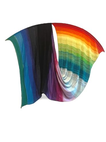 Folded rainbow gradient fabric with draped effect.