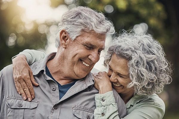 An older couple smiling