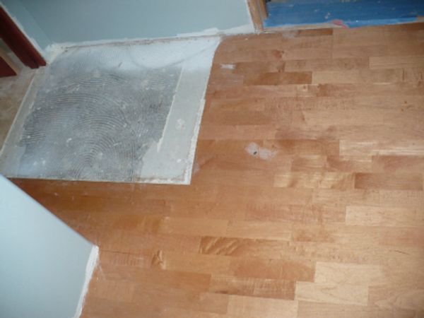 Maple flooring in need of repair