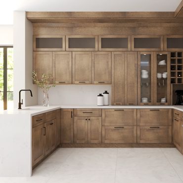Modern kitchen with wooden cabinets and white countertops.