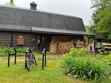 Floodwood Outpost with bike on a bike rack