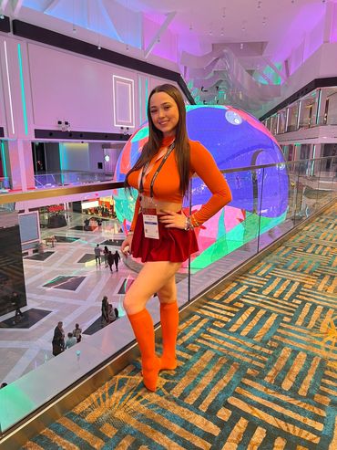 Ashley West cosplaying Velma at the 2023 AVN Expo