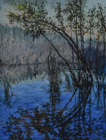 Tree saplings in marsh reflections in water