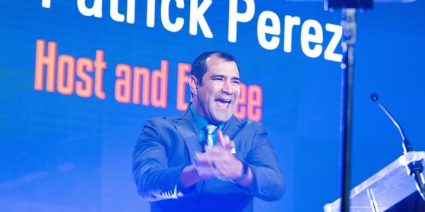 High energy keynote speaker Patrick Perez takes to the stage for an international conference!