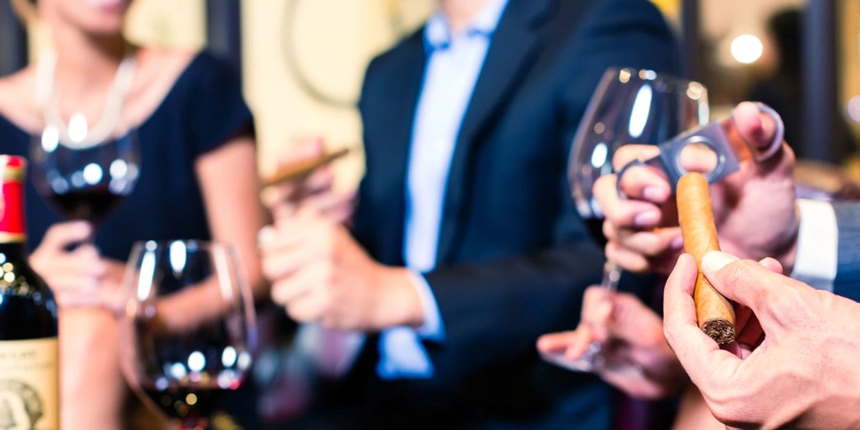 Cigar cutting at the cocktail party
