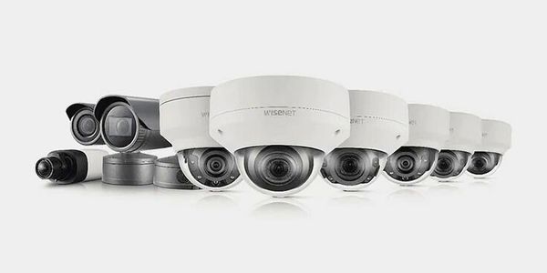 A lineup of modern Wisenet security cameras in various designs.
