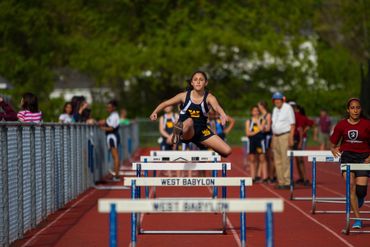 So you want to be a track superstar? Emily Golub representing West Babylon in the hurdles.