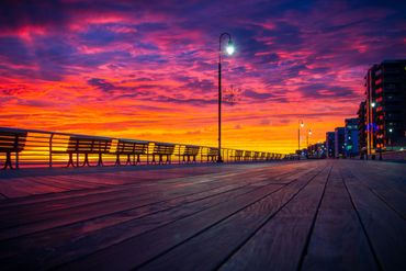 Long Beach, NY boardwalk at sunset in November. 