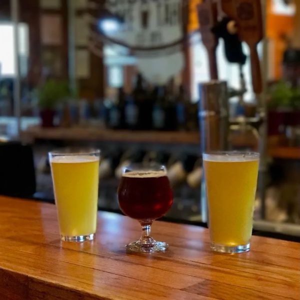 3 microbrews on bar at sidellis
