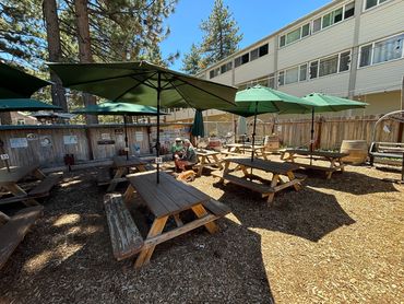 backyard patio with picnic tables