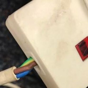 Extension lead with exposed electrical cables, wire