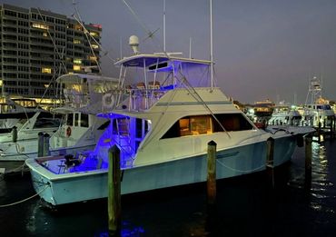 Starboard side picture of the Strike Zone Too at night