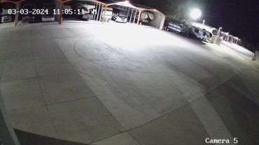 rv and boat storage facility at night surveillance cameras
