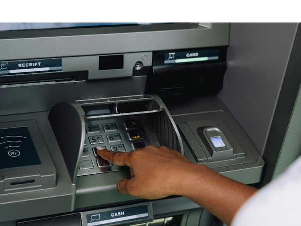 ATM keypad buttons being pushed