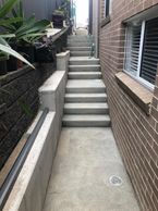 Concrete Pathway and Stairs to the side of the house