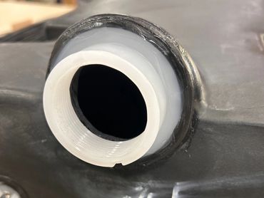 Welded RV tank fitting
