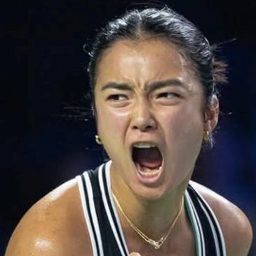 Athlete shouting intensely during a competition.
