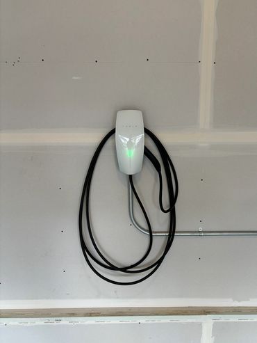 A new Tesla charger installed for a customer in his garage.