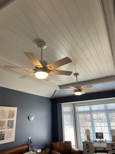 Two new ceiling fans installed in a customers bedroom.