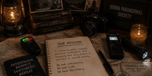 Paranormal investigation setup with notes and equipment.