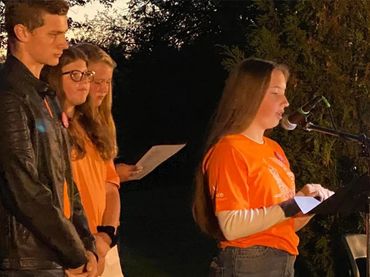 Youth Group members help lead the community Truth and Reconciliation Vigil on September 30th.