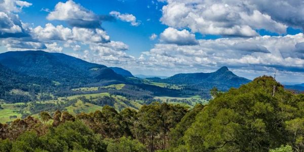 Scenic mountain landscape under a partly cloudy sky.