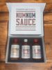 A gift box containing three bottles of Country Boy's Mild NumNum Sauce for Southern grilling and dipping.