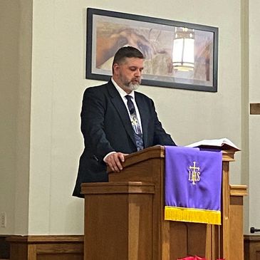 Pastor Chris Bonifield delivers a sermon.