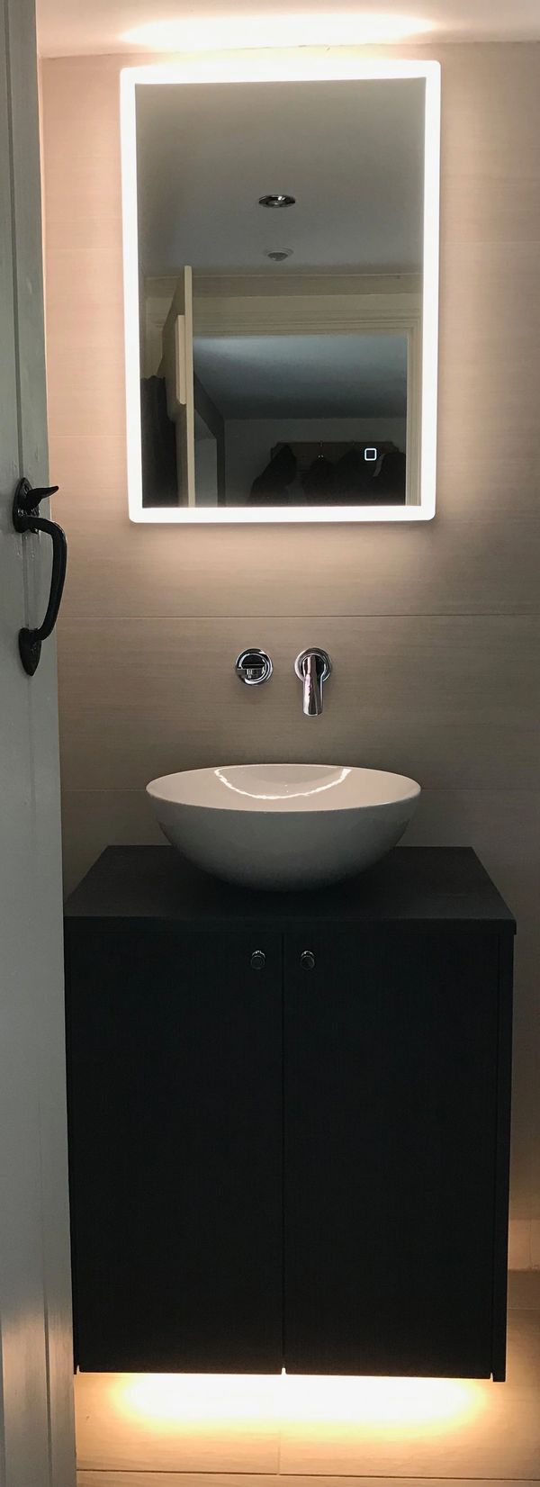 Sleek, stylish wall mounted basin, taps aligned, beautifully with countertop basin & Mirror.