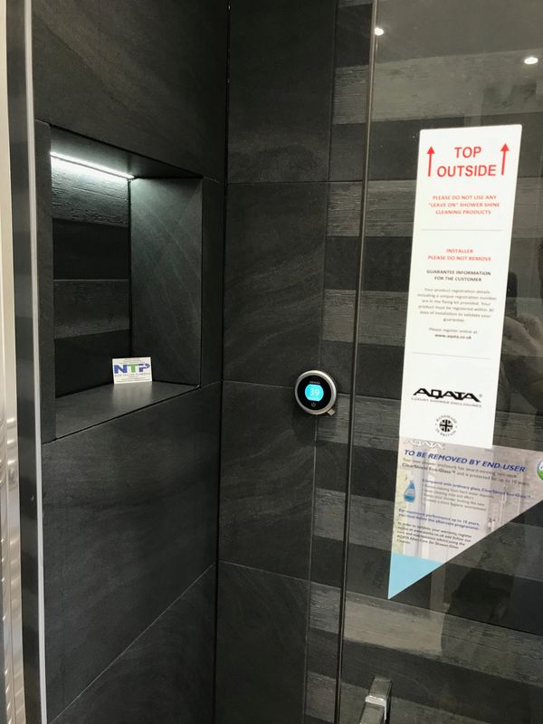 Shower Niche / Recess with Aqualisa smart shower control aligned beautifully with the grout lines.