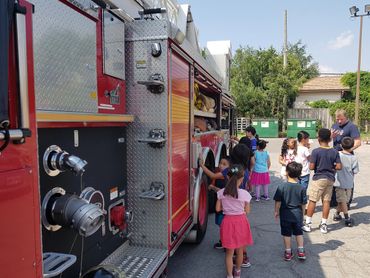 children visiting a fire truck