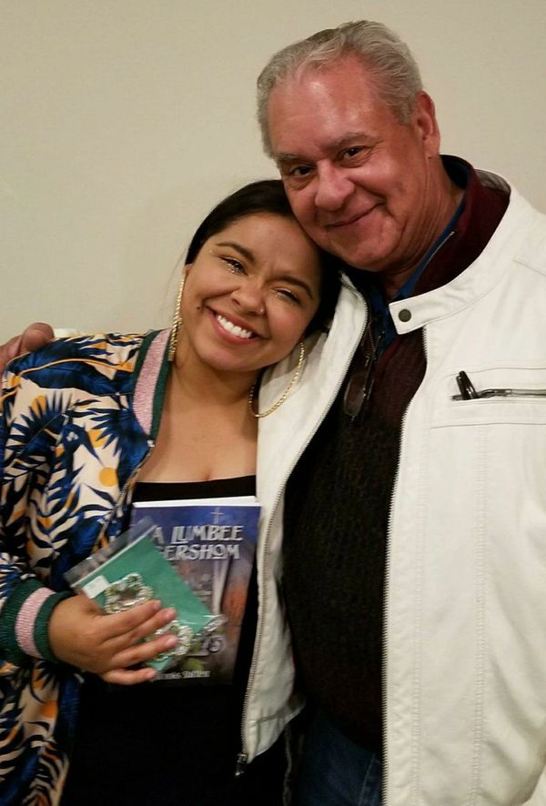Superstar from "The Voice" Brooke Sampson with her Uncle Perry. They love the book, A Lumbee Gershom