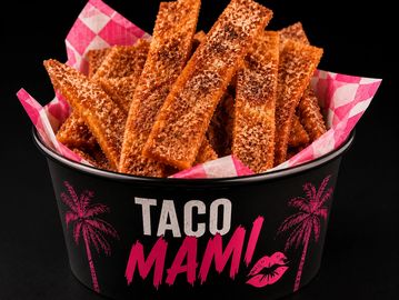 Crispy cinnamon sugar churro fries in a Taco Mami branded container.
