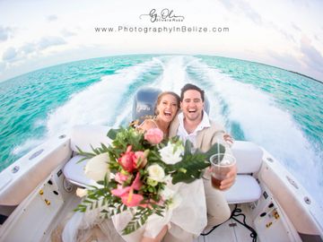 Bridal shoot on speed boat over caribbean sea. Fun in the sun, only bride and groom