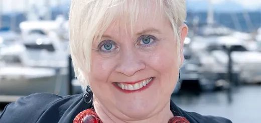 Photo of Lori Ann Reinhall, Editor-in-Chief, The Norwegian American newspaper on Michael Kleiner Pub