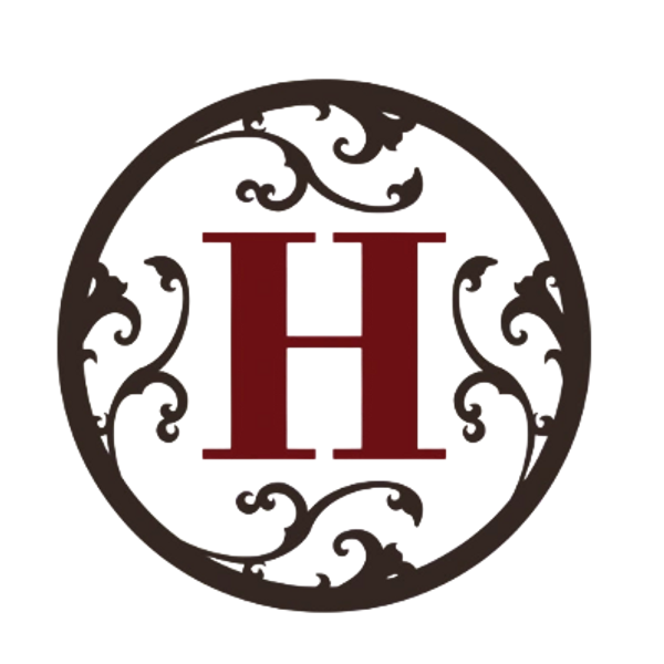 A decorative circular emblem featuring a bold red letter H with ornate black flourishes.