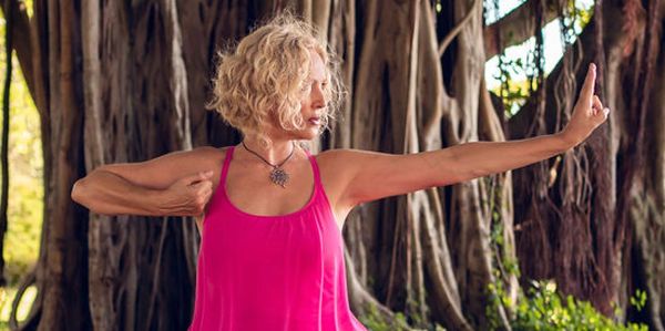 Qigong Bow and Arrow pose for focus and intention.  Qigong movement meditation is part of a retreat.