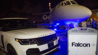 Susan Penrod PR: Overfinch Range Rover and a Falcon plane at Sheltair Aviation's Wings Wheels Water