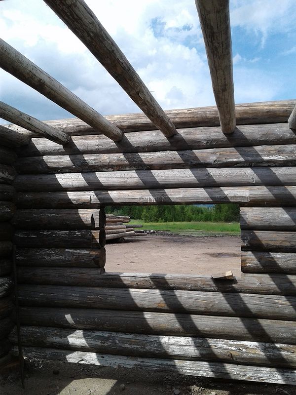 various phases of building/restoring Maki Cabin