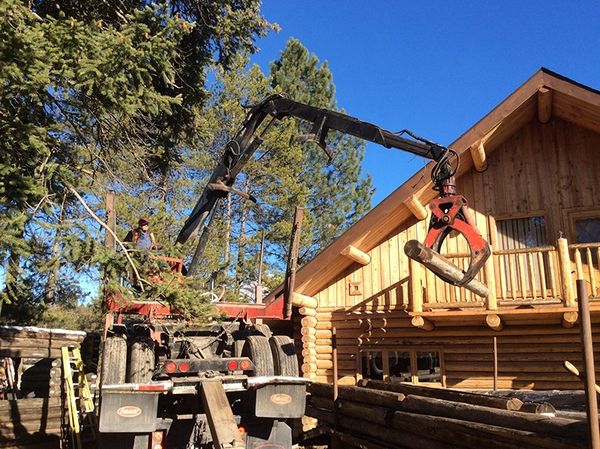 various phases of building/restoring Maki Cabin