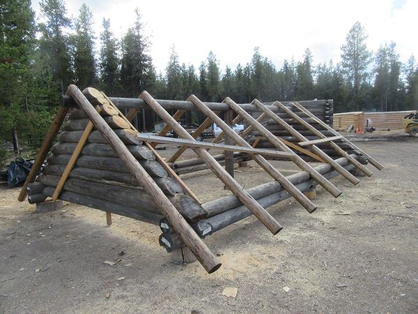 various phases of building/restoring Maki Cabin