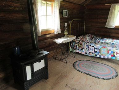 Inside a historic cabin at Swam Valley Museum