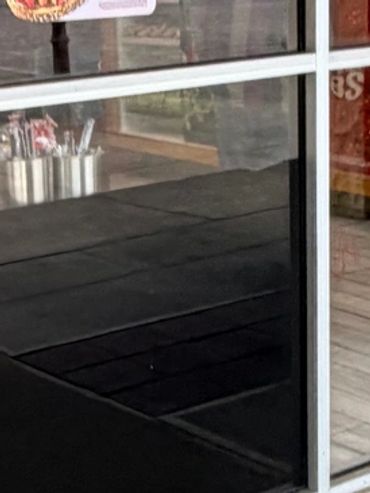 Commercial building windows and entrance cleaned by Pristine Cleaning Partners in Auburn, AL