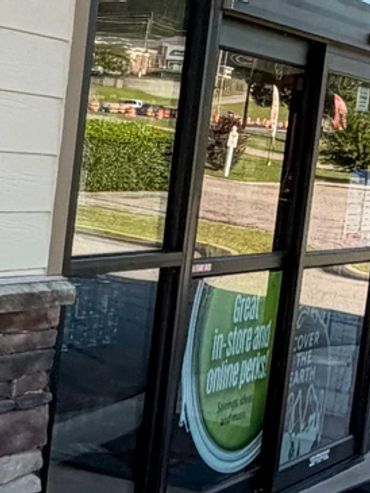 Crystal-clear storefront glass after professional window cleaning in Opelika, AL
