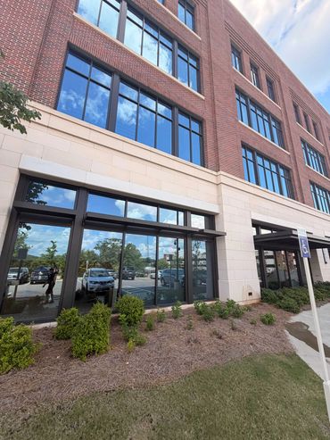 Streak-free commercial storefront windows after professional window cleaning in Auburn, AL
