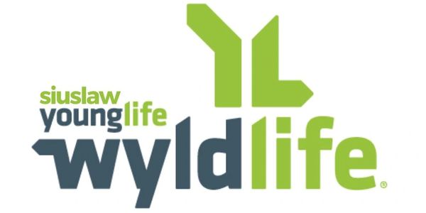 Logo of Siuslaw Young Life with green and dark blue text.
