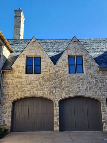Black window frames with coated glass.