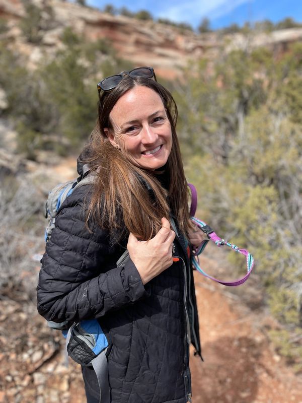 Woman hiking in desert nature adventure