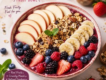 Colorful fruit and granola bowl.